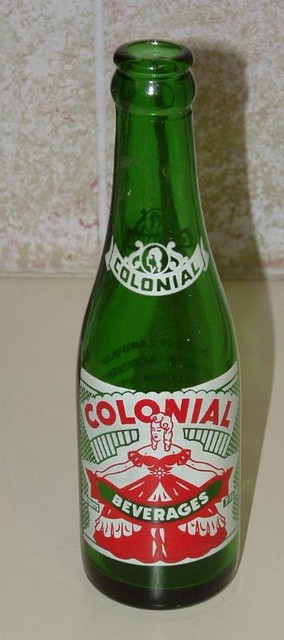 Colonial Cola with lady in Colonial dress 