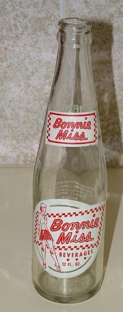 Bonnie Miss bottle with lady in Scottish dress